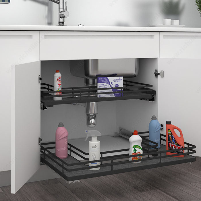 Under-sink cabinet organizer with cleaning supplies in a kitchen setting